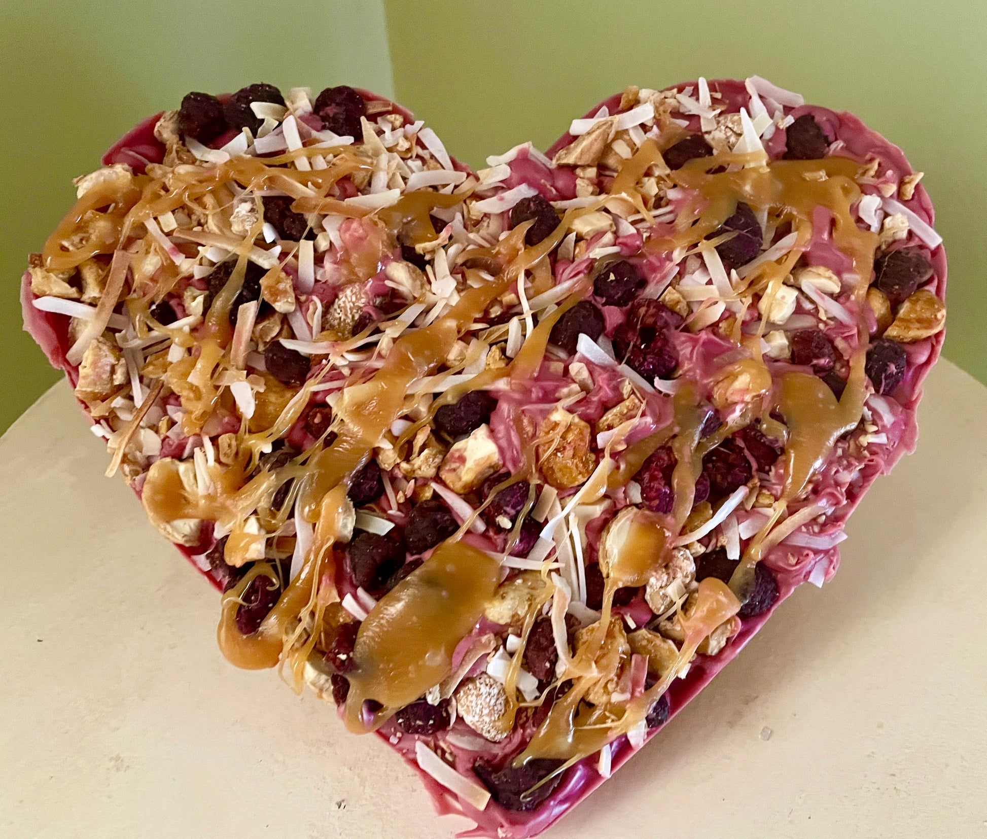 Ruby Chocolate raspberry,coconut, parline cashew caramel Bark